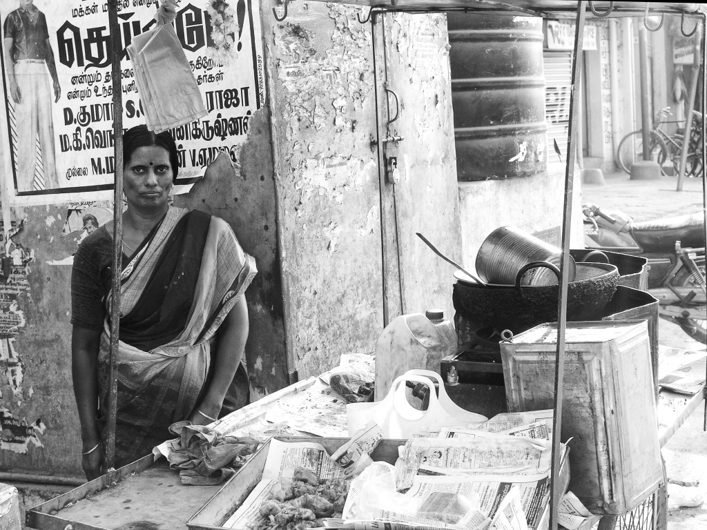 A woman at her mobile food-stall. Madurai, India