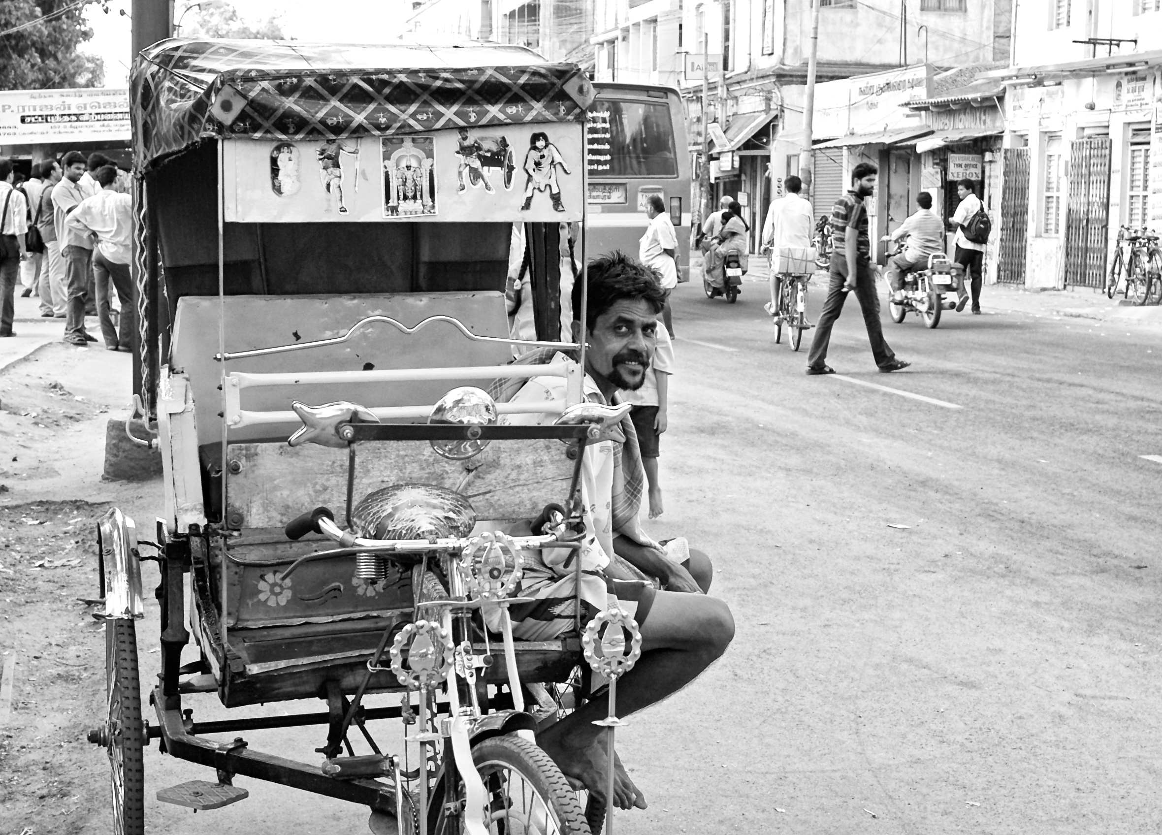 Rickshaw man on the road. Madurai, India