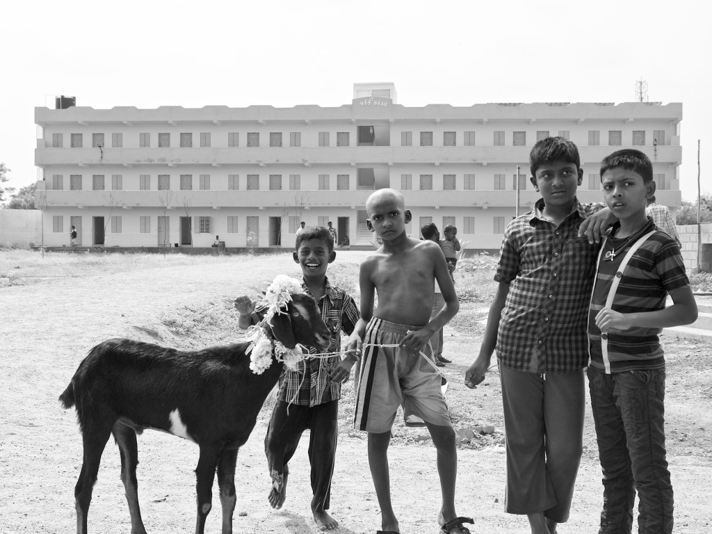 Kids with the goat that is decorated for offering.
Puliyampatti Church, Tirunelveli, India