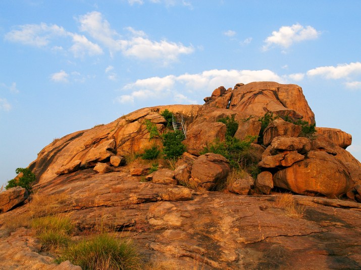 Yanaimalai (Elephant Hill), one of a jaina Abode from 8th Century AD, glistening in the Golden hour.  Othakadai, Madurai, Tamil Nadu, India
